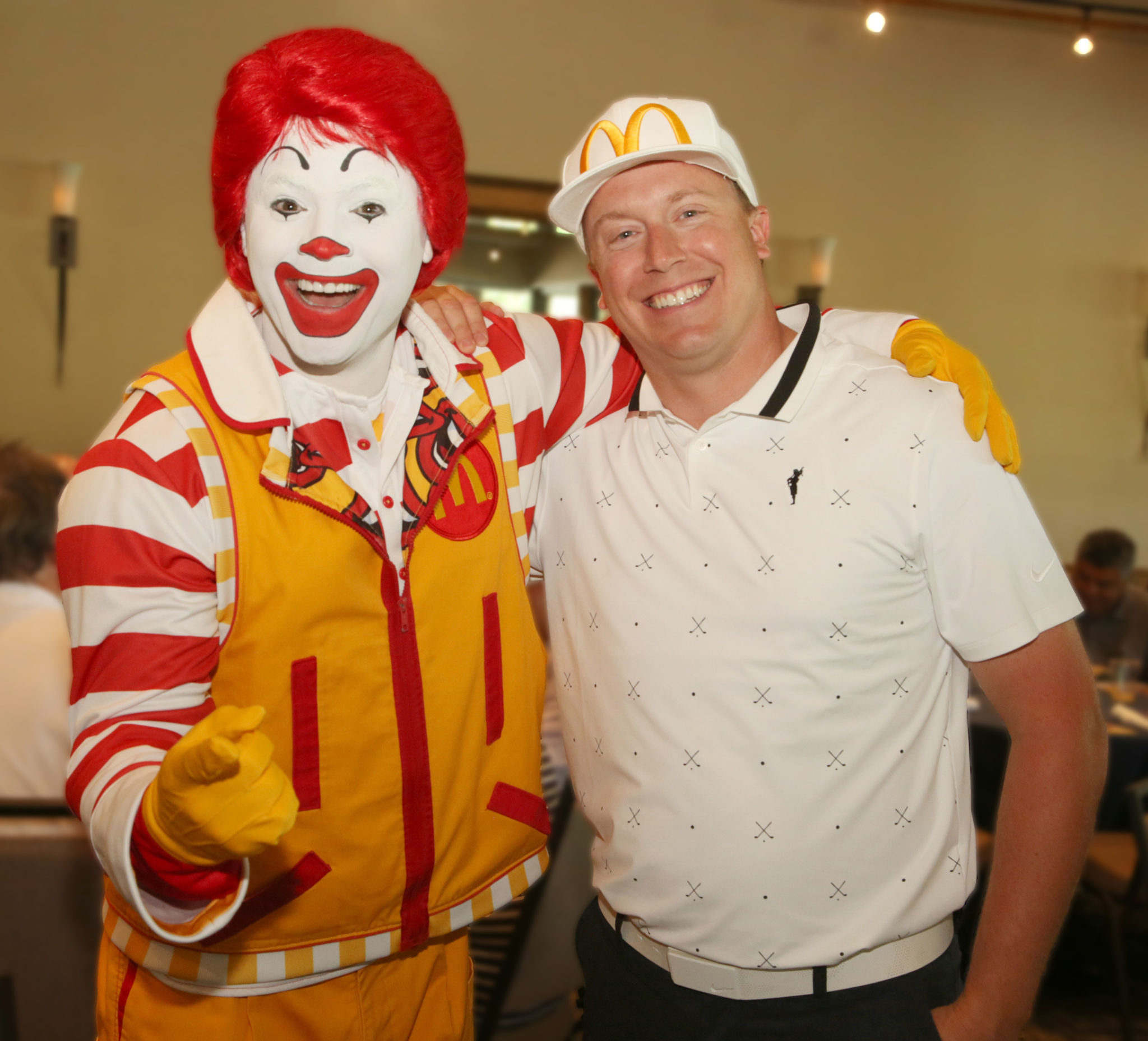 Ronald McDonald poses with RMHC Board Member and McDonald's Owner/Operator Chris Carney